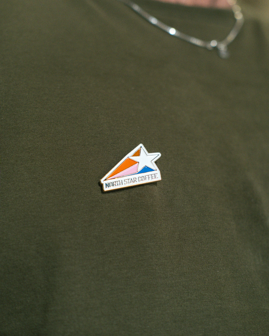 NS* Pin Badge